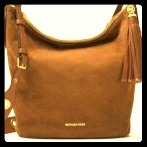 michael kors brooklyn grommet feed bag|MICHAEL MICHAEL KORS Brooklyn Large Grommet Leather .